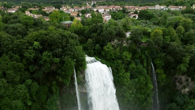 Drone Flying Towards The Foamy Cascades Of Marmore Falls, Cascata Delle Marmore In Umbria Region, Italy. Aerial Shot