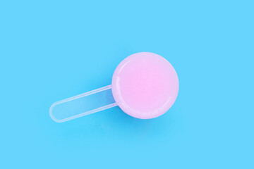 Fabric softener on blue background.