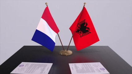 Albania and France national flags on table in diplomatic conference room. Politics deal agreement