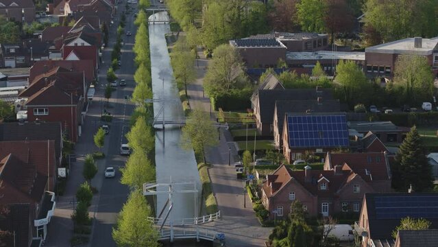 Small City in north germany with a canal system and curch drone shot
