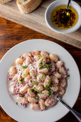 Gnocchi. Pasta sautéed with truffles garlic, onions, olive oil and fresh herbs and spices. Classic American steakhouse or French bistro appetizer or side dish.