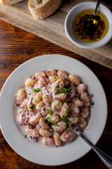 Gnocchi. Pasta sautéed with truffles garlic, onions, olive oil and fresh herbs and spices. Classic American steakhouse or French bistro appetizer or side dish.