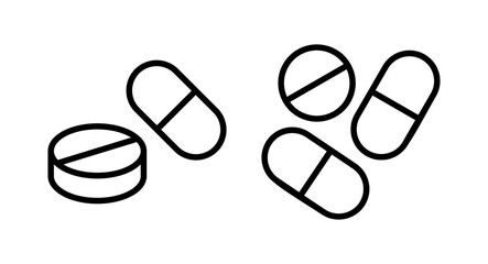 Pills icon vector illustration. capsule icon. Drug sign and symbol