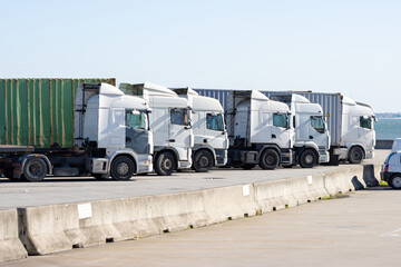 Trucks stand in a row near the seaport