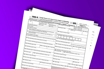 Obraz premium Form 1042-S documentation published IRS USA 44115. American tax document on colored