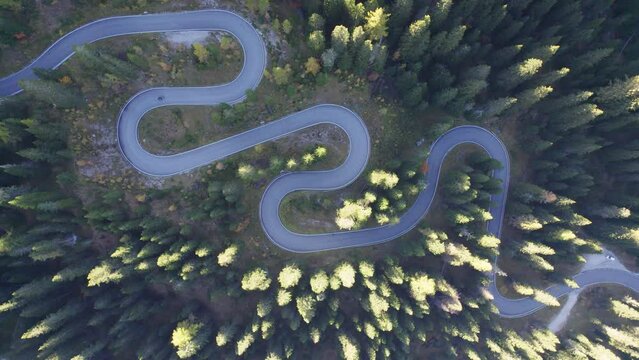 Aerial view of curved asphalt road on the mountain
