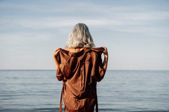 Mature Woman With Grey Hair At The Beach