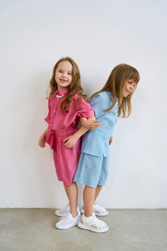 children girls in pink and blue