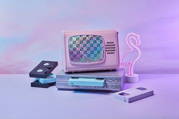 Vintage TV with holographic screen, VCR player.