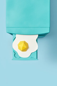 90s computer with paper fried egg in CD drive.