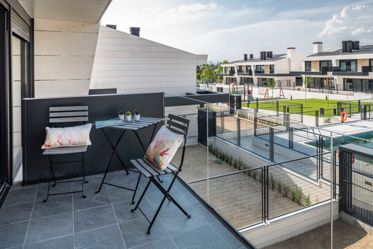 Modern balcony with luxury residential complex views at daytime