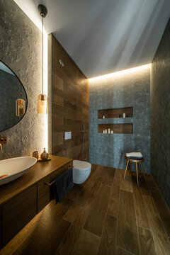 Modern minimalistic residential bathroom interior with open shower