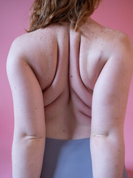 Young Woman Stretching Her Back