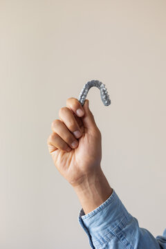 3d model of teeth in a male hand