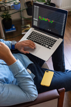 laptop on man's knee