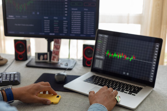 trader's hands at work
