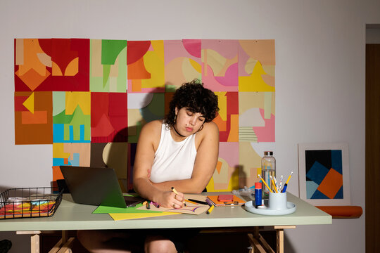  woman drawing in her studio