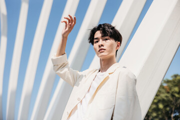 Portrait of  fashion Asian man posing