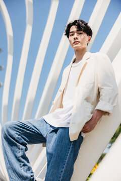 Portrait of  fashion Asian man posing