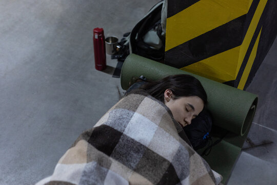 woman sleeping on a mattress