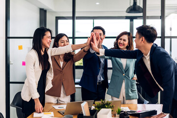 Successful of group professional business people to win of celebrating project success.Creative business giving hi five good teamwork together at office © Art_Photo