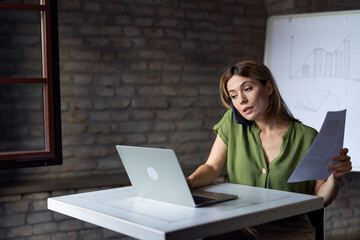 Busy business woman working in office