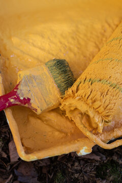 Wall painting tool and brushes with yellow 