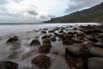 Landscape of Puamau Bay in Hiva Oa, Marquesas Islands, French Polynesia. Sea side with rocks and mountains.