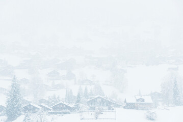 Misty village in winter