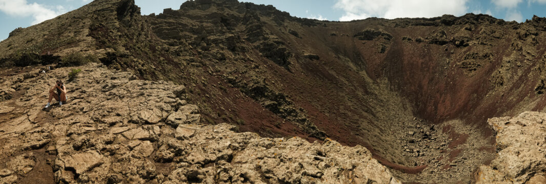 Woman in the top of volcano