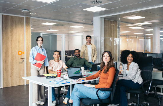 Happy Multiethnic Teamwork In A Coworking Space