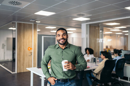 Smiling businessman in the office