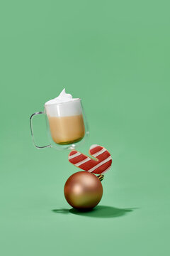 A cup of chocolate latte with Christmas balls