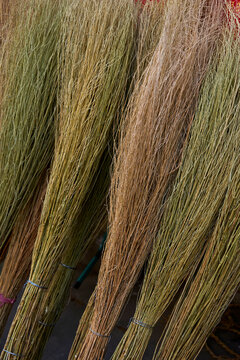 Closeup of a handmade broom, made with plants