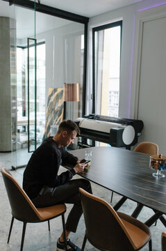 A worker has a break at the kitchen office