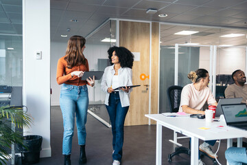 Business women working in a coworking space.