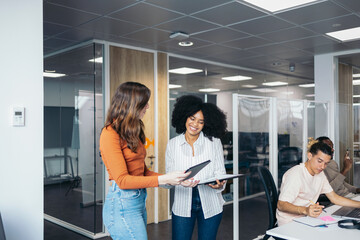 Business women working in a coworking space.