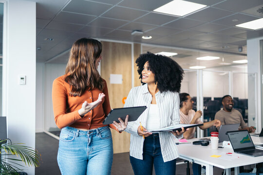 Business women working in a coworking space.