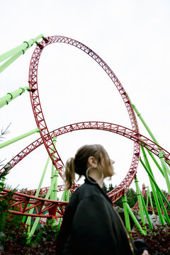 Beautiful Girl On A Background Of A Roller Coaster