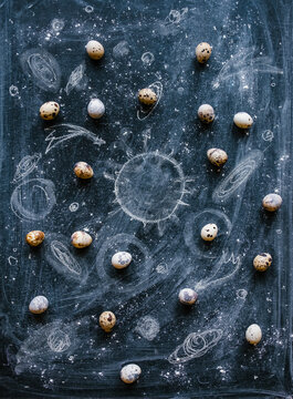 Quail Eggs On A Drawing Board.