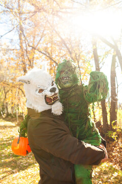 Father and son disguised on Halloween