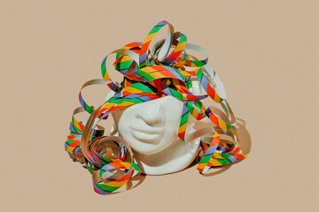 multicolored streamers in a porcelain head