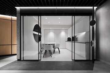 White minimalistic kitchen in modern office