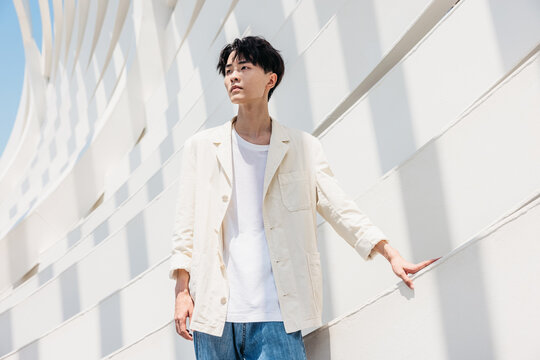 Portrait of  fashion Asian man posing