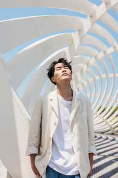 Portrait of  fashion Asian man posing