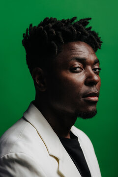 Portrait of serious black man with dreadlocks