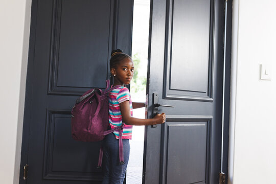 Portrait Of African American Girl Wearing Backpack, Leaving For School, With Copy Space