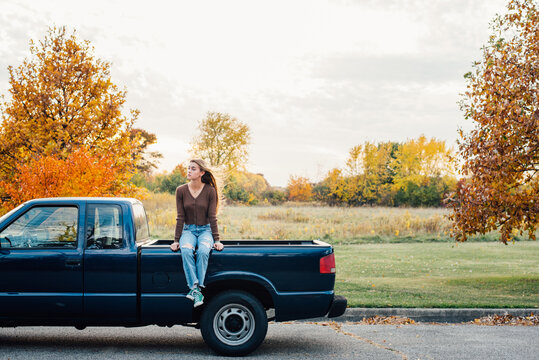 Teen girl on truck