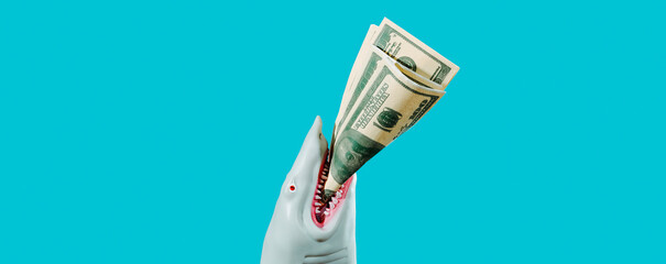 shark biting some fake dollars, banner format
