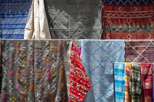 Traditional oriental scarves hanging in market